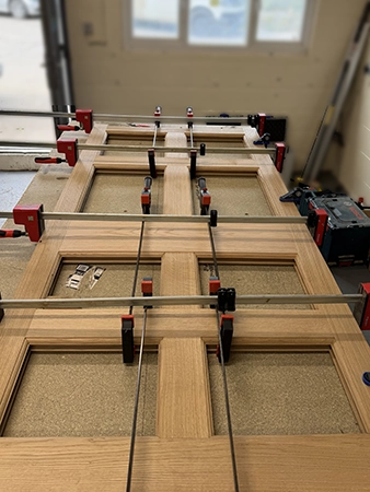 Dry assembled stiles rails and mullions